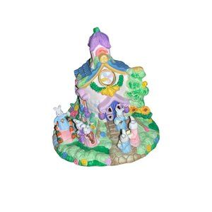 Ceramic Easter House—Rabbits bridge flowers